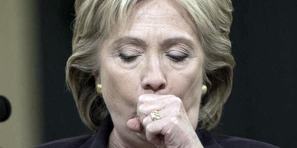 Hillary-Clinton-Coughing-Close-up-01-Hillary_s-Chronic-Cough-Returns-At-Democratic-Debate_grande.jpg